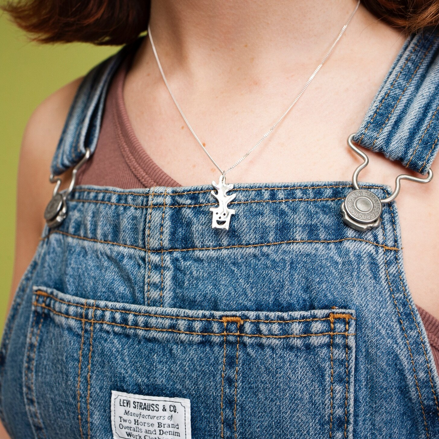 Woman wearing Smiley Plant Pot Necklace